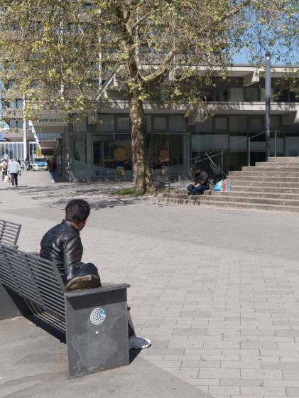 Man Sitting on a Bench
