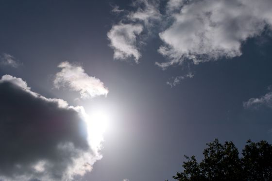 Sun behind Cloud